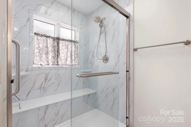 a bathroom with a sink a vanity and a mirror