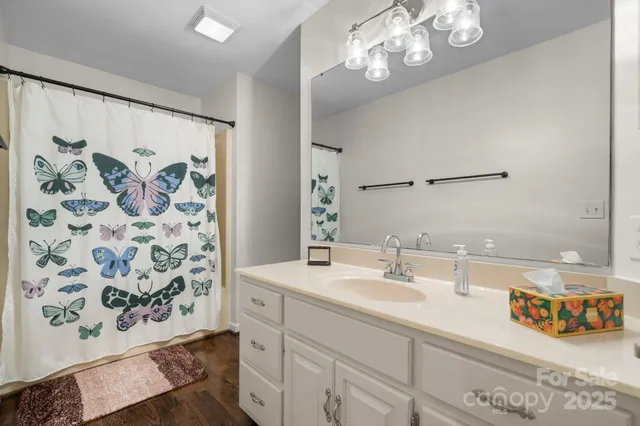 a room with gym equipment and a window