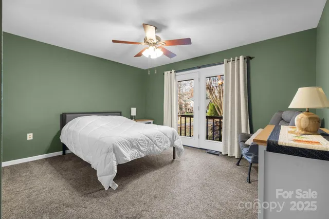 a view of a room with wooden walls