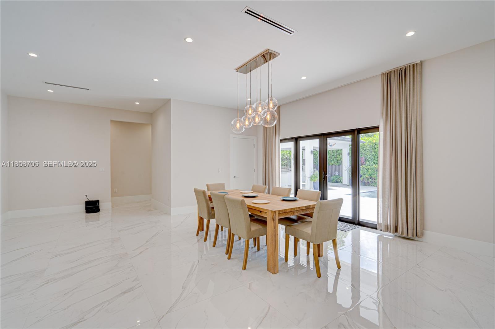 2521 Southwest 105th Avenue Miami, FL 33165 - Photo 11 of 68 a dining room with furniture and window