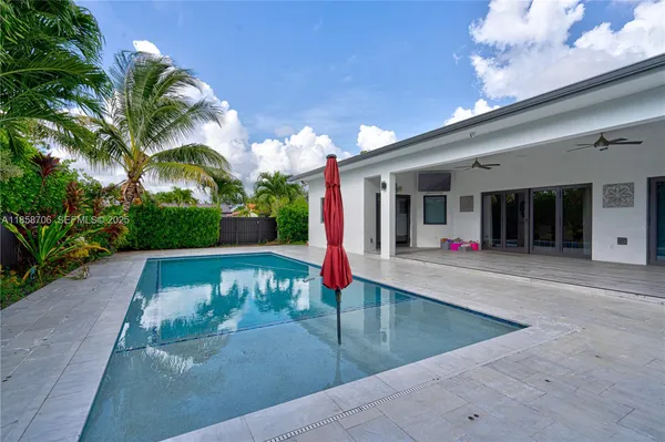 a house view with a outdoor seating space