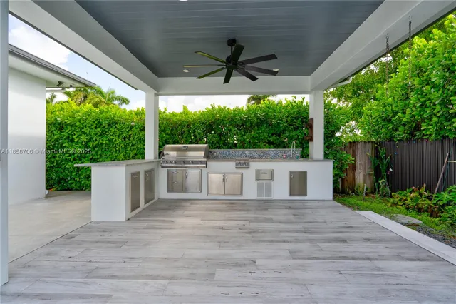 an aerial view of residential house with outdoor space