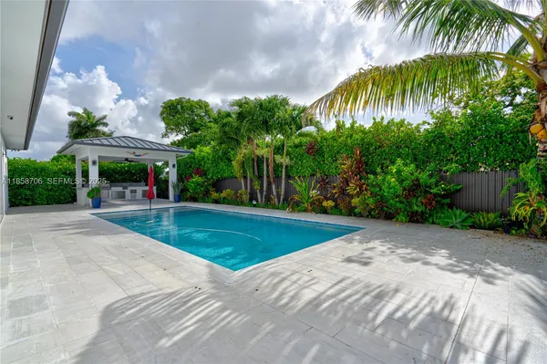 an aerial view of residential house with outdoor space