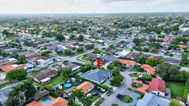 a view of a kitchen with furniture and a window