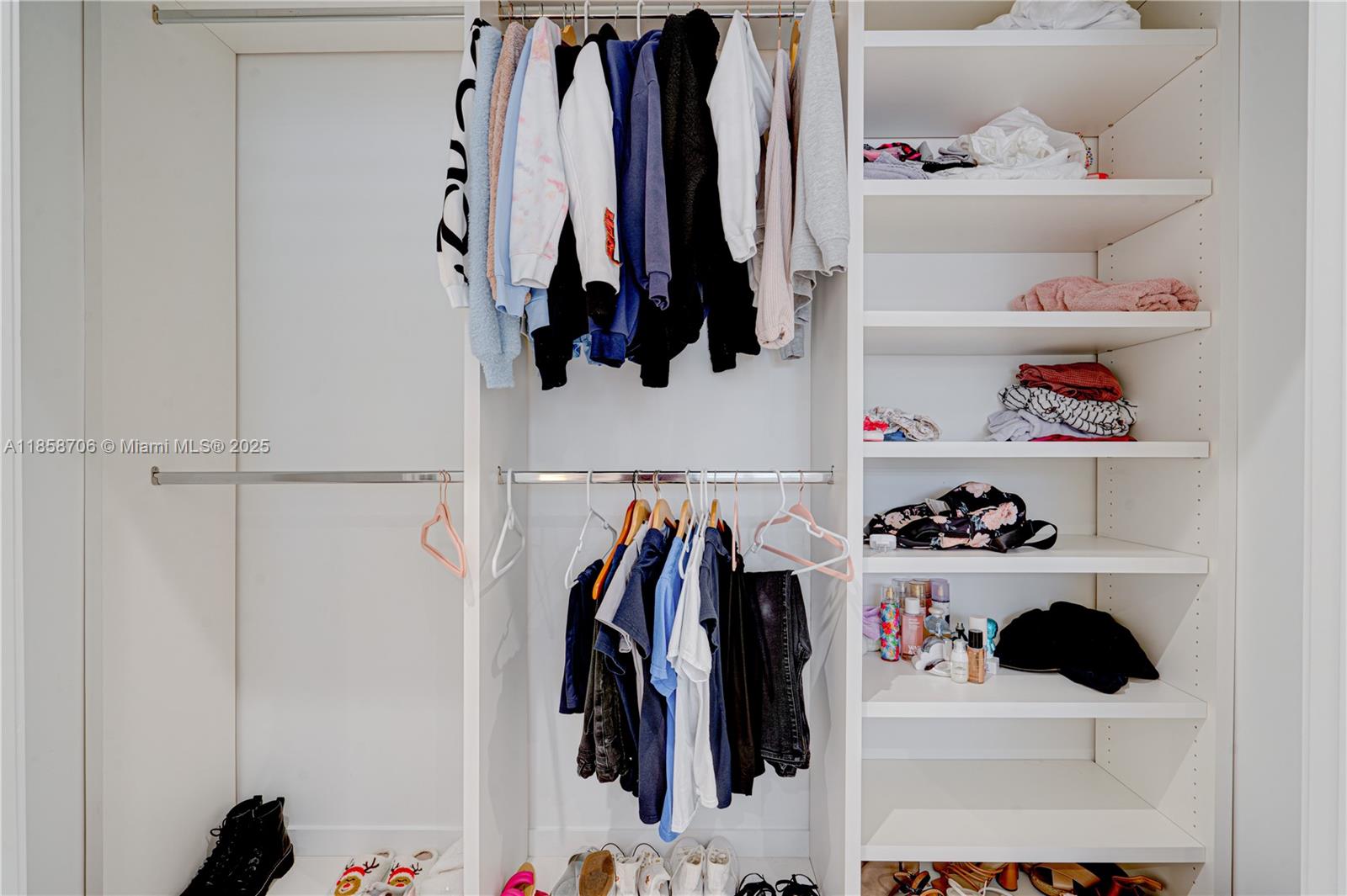 2521 Southwest 105th Avenue Miami, FL 33165 - Photo 38 of 68 a view of walk in closet with clothes and shoes