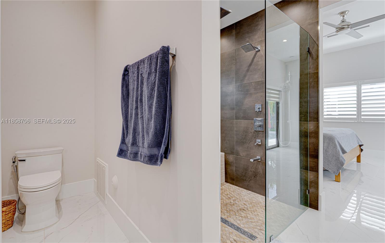 2521 Southwest 105th Avenue Miami, FL 33165 - Photo 55 of 68 a bathroom with a toilet and a shower