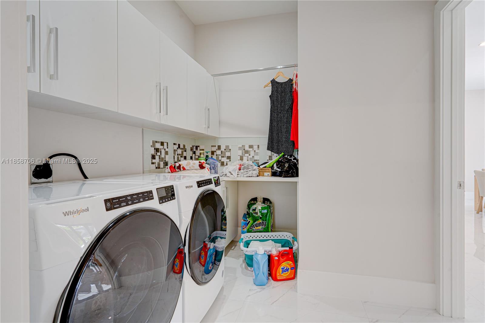 2521 Southwest 105th Avenue Miami, FL 33165 - Photo 64 of 68 a utility room with dryer and washer