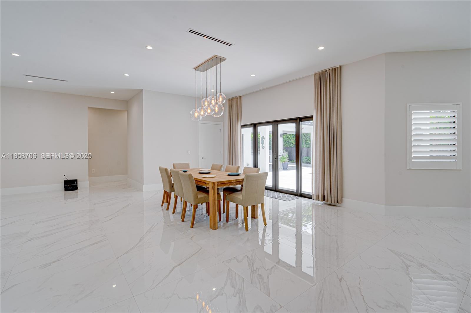 2521 Southwest 105th Avenue Miami, FL 33165 - Photo 10 of 68 a dining room with furniture and window