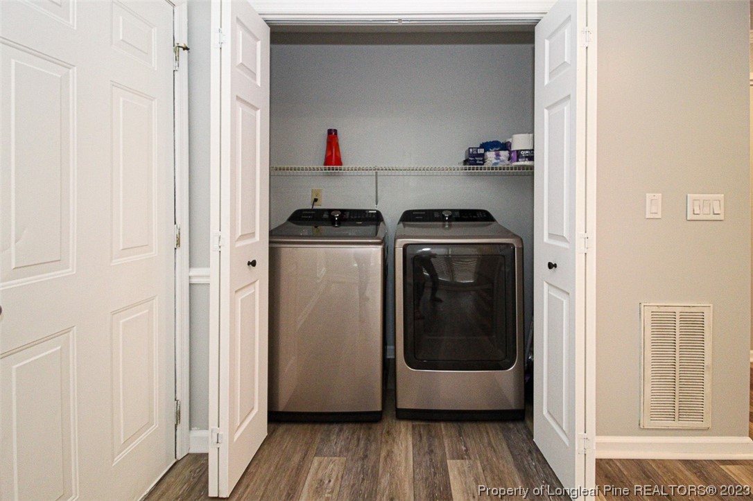 544 Blackbird Road Fayetteville, NC 28314 - Photo 15 of 36 a utility room with dryer and washer