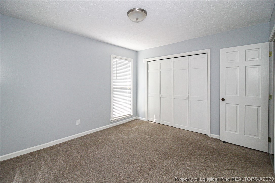 544 Blackbird Road Fayetteville, NC 28314 - Photo 18 of 36 a view of an empty room and window