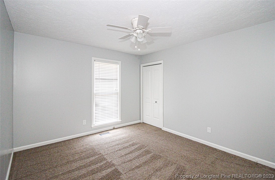 544 Blackbird Road Fayetteville, NC 28314 - Photo 19 of 36 a view of an empty room with a window