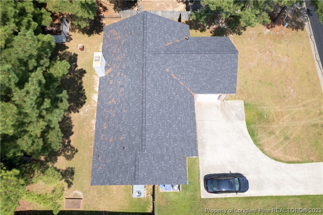 544 Blackbird Road Fayetteville, NC 28314 - Photo 31 of 36 an aerial view of a house with swimming pool and large trees