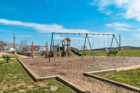a view of backyard with green space