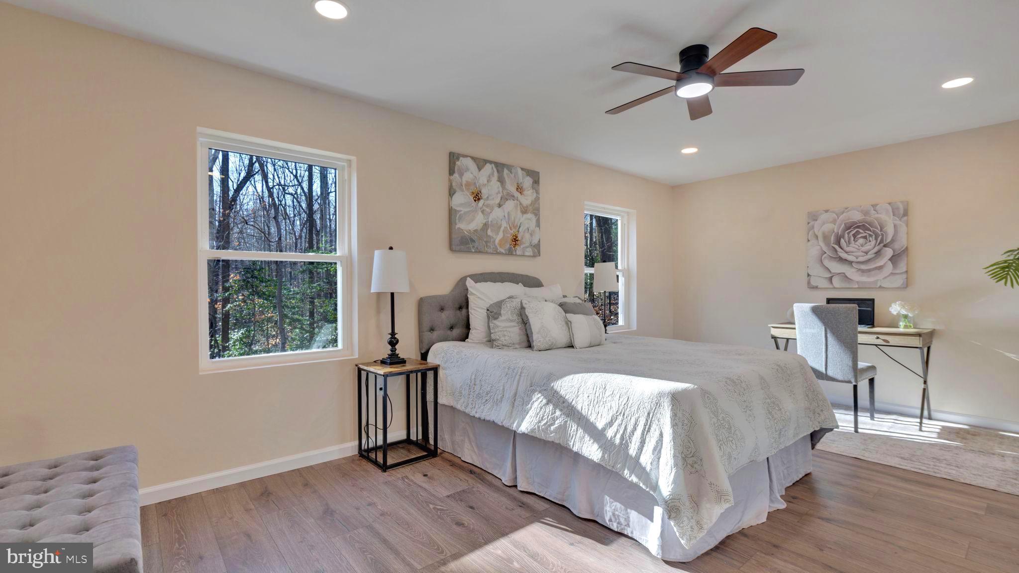 10965 La Plata Road La Plata, MD 20646 - Photo 15 of 24 a bedroom with a large bed and a window