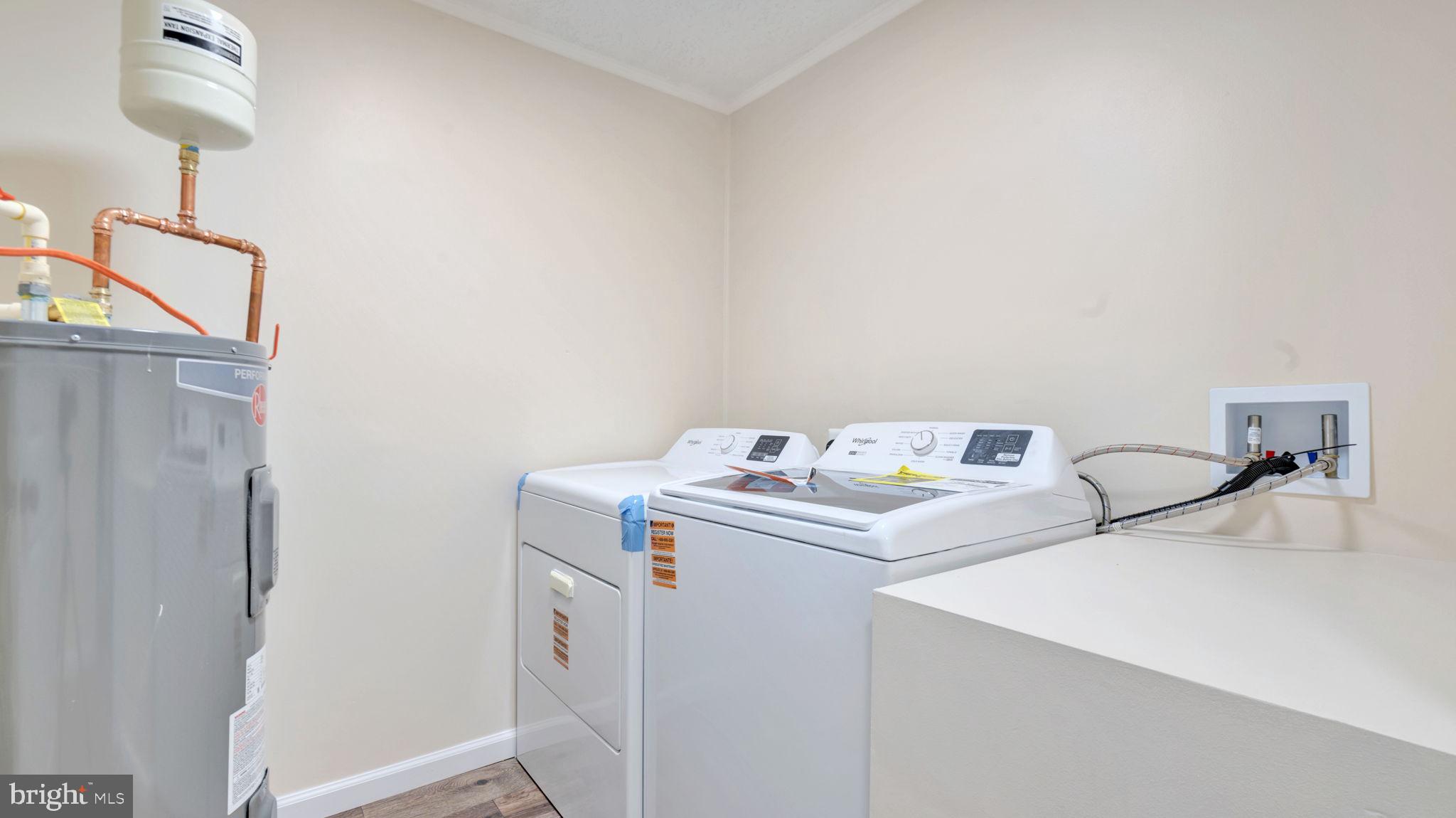 10965 La Plata Road La Plata, MD 20646 - Photo 18 of 24 a utility room with dryer and washer