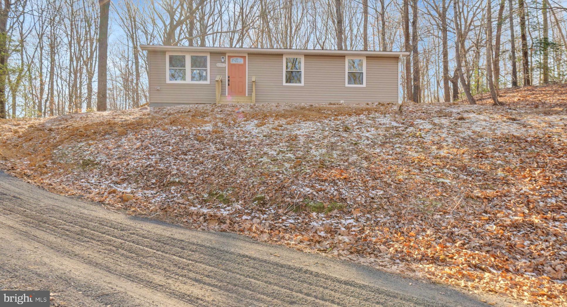 10965 La Plata Road La Plata, MD 20646 - Photo 2 of 24 front view of a house with a dry yard