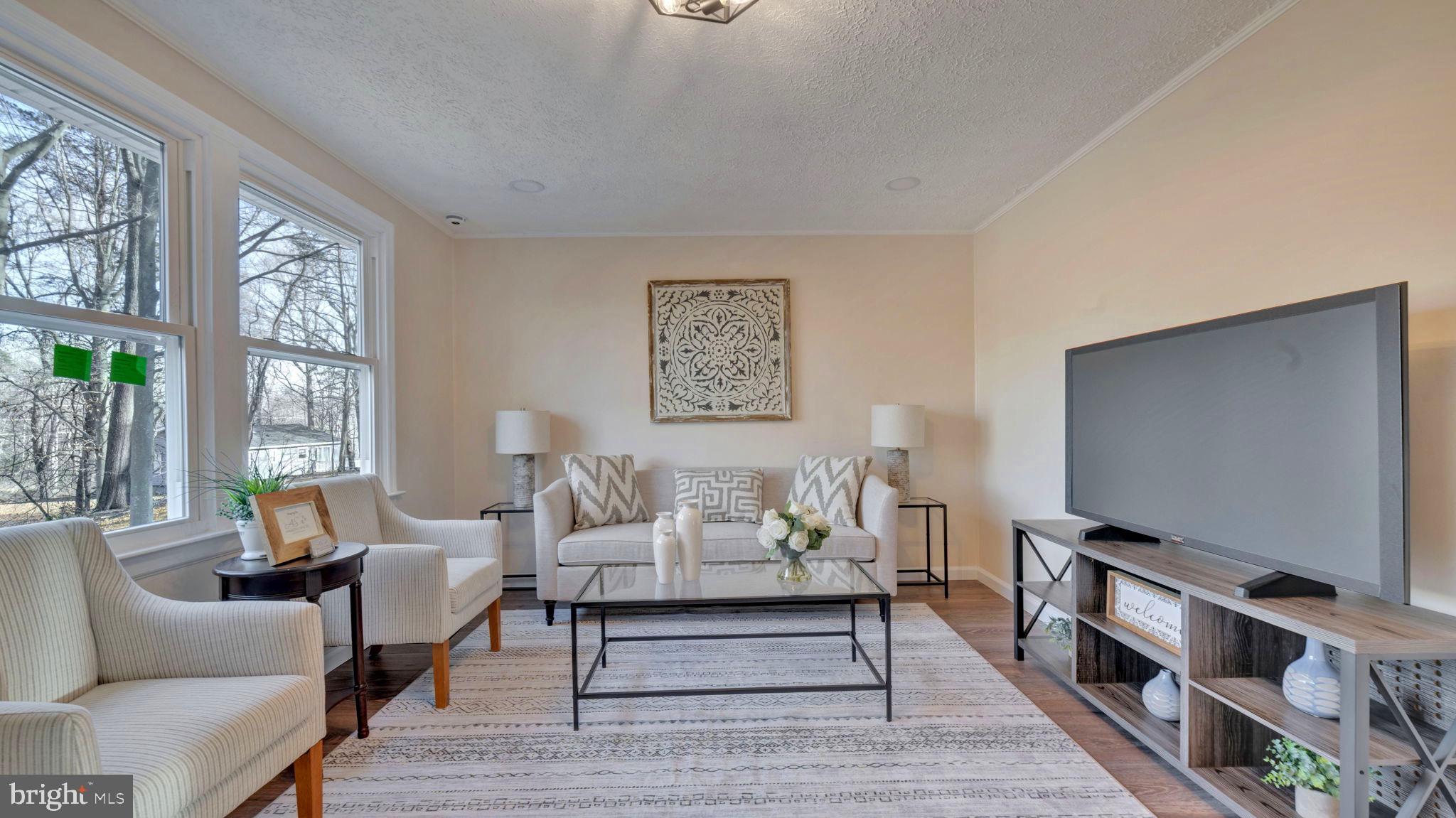 10965 La Plata Road La Plata, MD 20646 - Photo 4 of 24 a living room with furniture and a flat screen tv