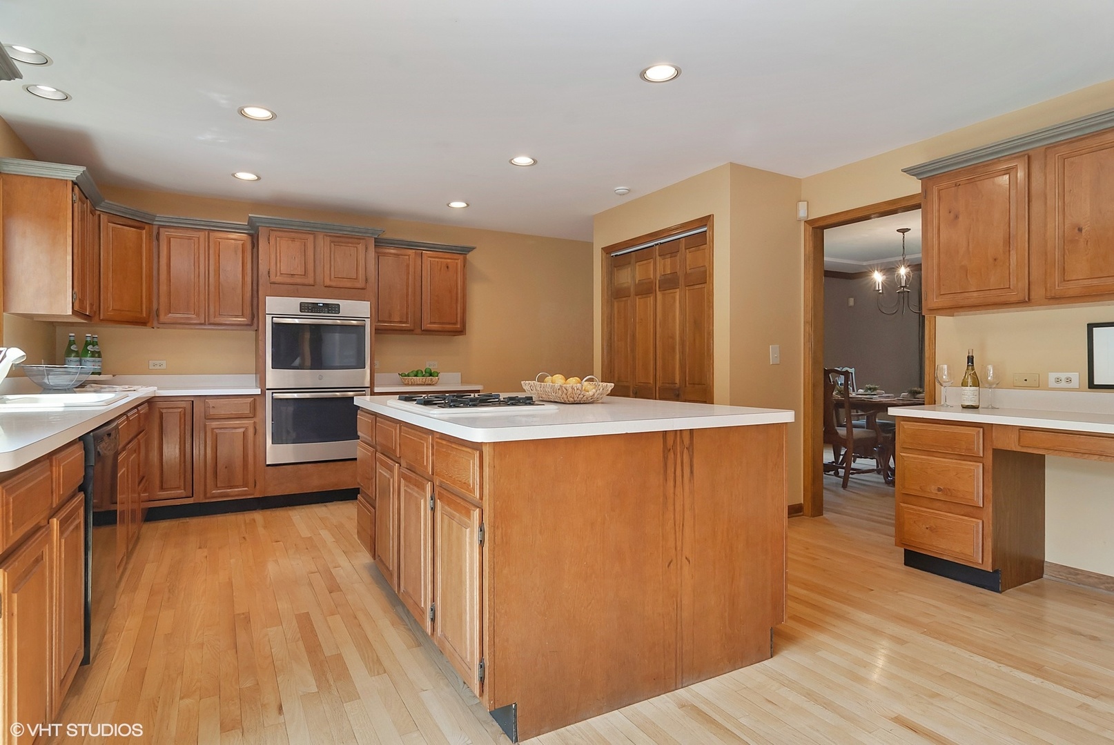 8050 A Finnie Road Newark, IL 60541 - Photo 3 of 24 a large kitchen with kitchen island a sink a counter top space stainless steel appliances and cabinets