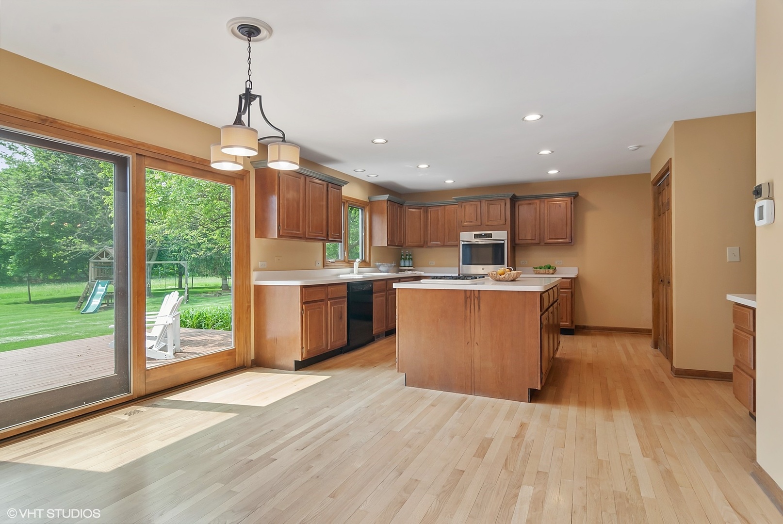 8050 A Finnie Road Newark, IL 60541 - Photo 4 of 24 a view of a kitchen with a sink wooden floor and a kitchen