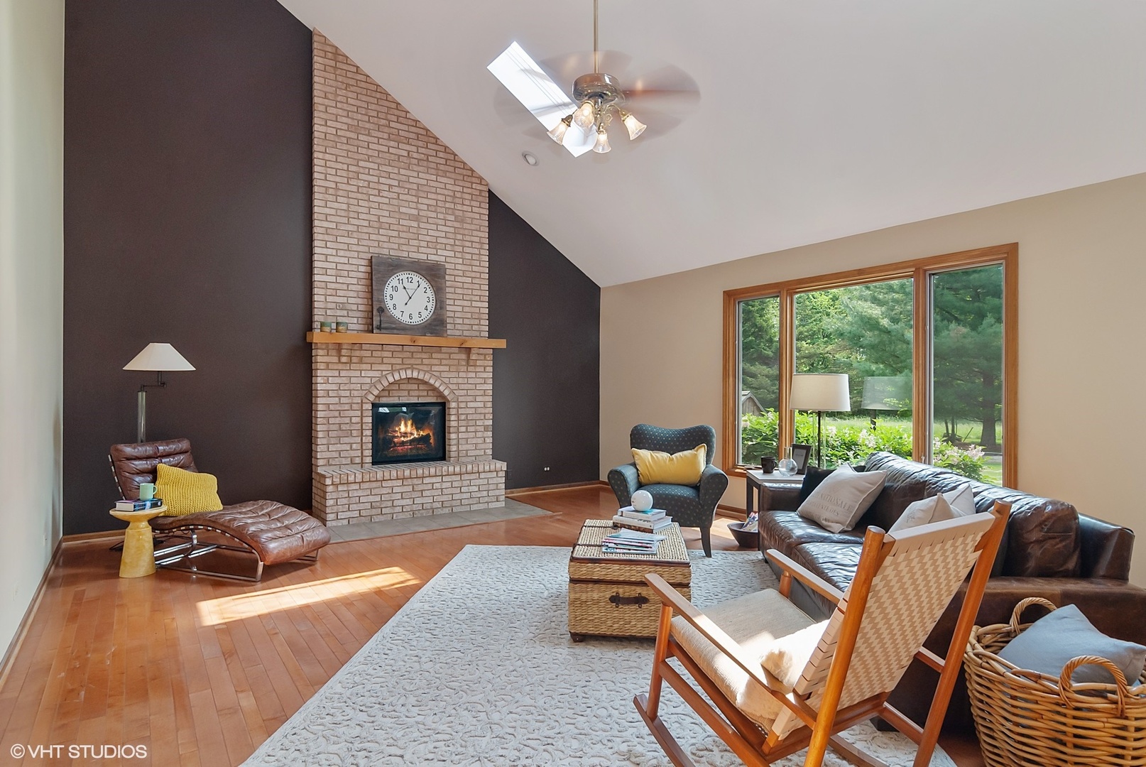 8050 A Finnie Road Newark, IL 60541 - Photo 5 of 24 a living room with furniture a fireplace and a large window