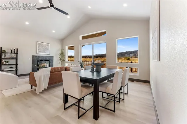 a dining room with furniture and window