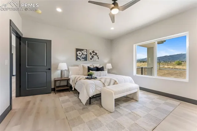 a bed room with a bed and a window