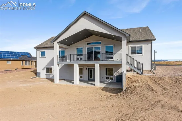 a view of houses with a lake and mountain view