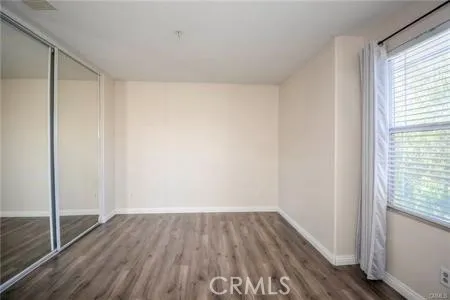 a view of small space with wooden floor