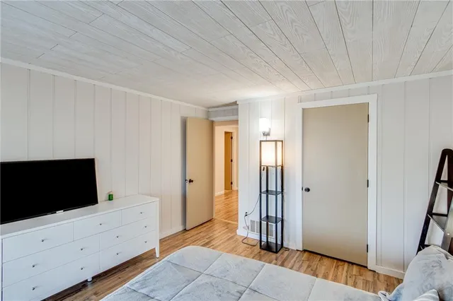 a view of a room with table and chairs
