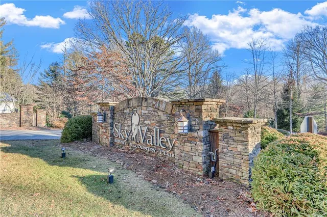 an aerial view of a house with outdoor space