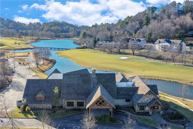 an aerial view of a house with a garden