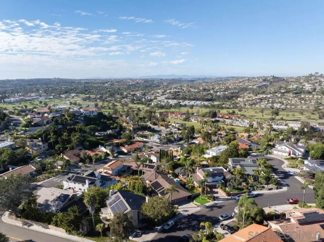 an aerial view of a city with lots of residential buildings