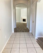 3169 Riverside Drive Carrollton, TX 75007 - Photo 15 of 16 a view of a livingroom with wooden floor