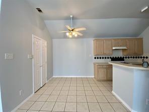 3169 Riverside Drive Carrollton, TX 75007 - Photo 6 of 16 a view of an empty room with a window