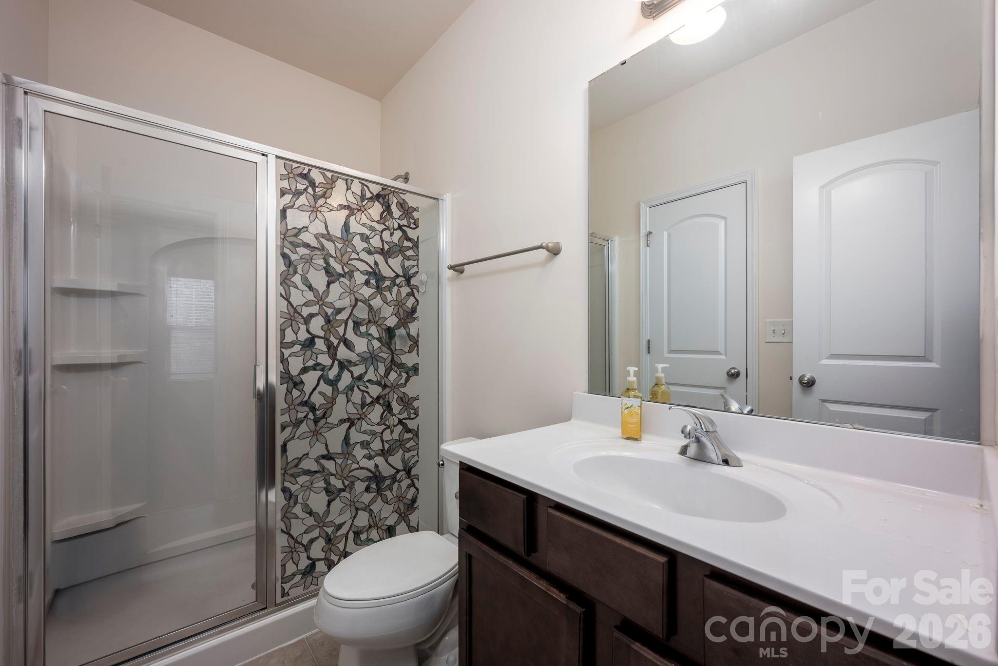 179 Limerick Road, Unit D Mooresville, NC 28115 - Photo 16 of 21 a bathroom with a sink toilet and shower