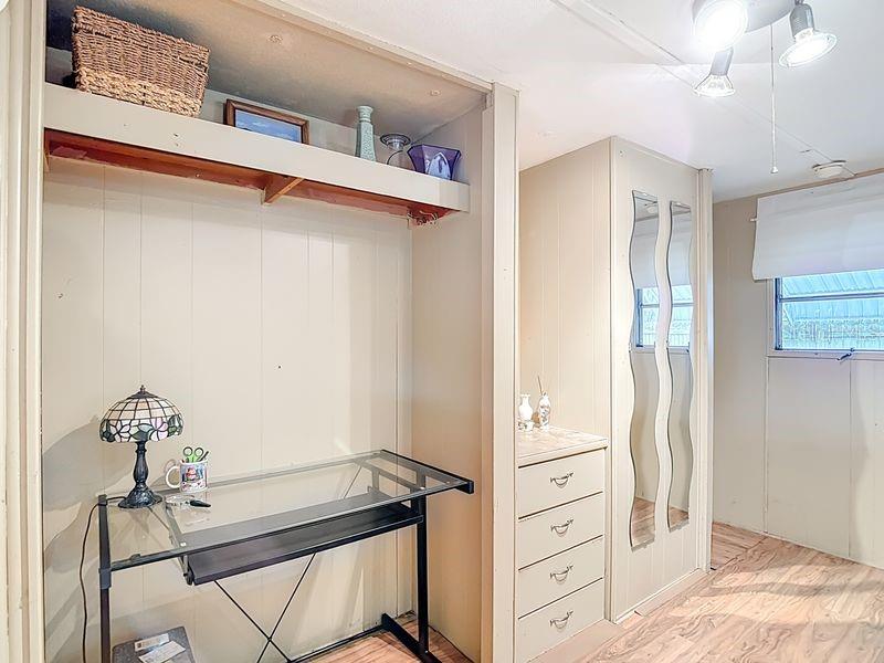 8145 Campbell Court New Port Richey, FL 34653 - Photo 14 of 34 a bathroom with a bathtub and a shower