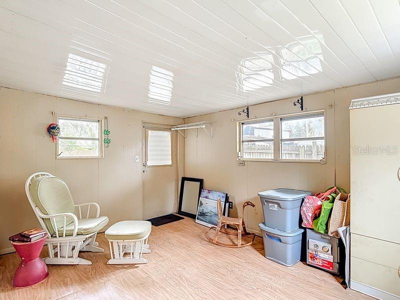 8145 Campbell Court New Port Richey, FL 34653 - Photo 22 of 34 a living room with furniture and a wooden floor