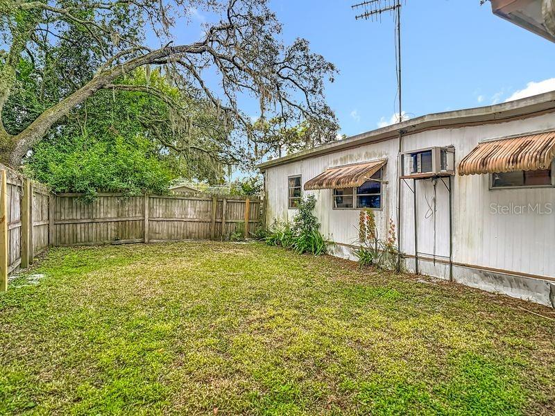 8145 Campbell Court New Port Richey, FL 34653 - Photo 29 of 34 a view of a backyard