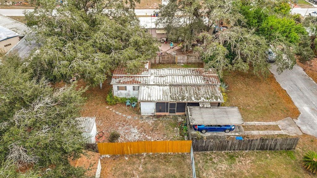 8145 Campbell Court New Port Richey, FL 34653 - Photo 33 of 34 a building with trees in front of it