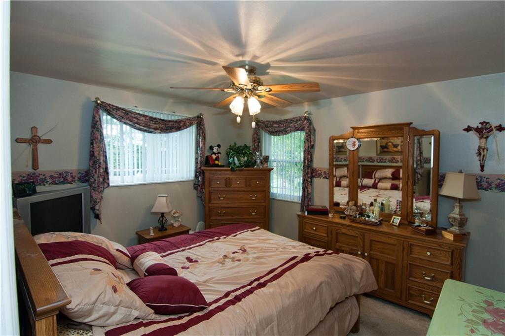 900 Rosalind Road Pittsburgh, PA 15237 - Photo 6 of 10 The 12x11 Master Bedroom features wall-to-wall carpeting and has hardwood flooring beneath.