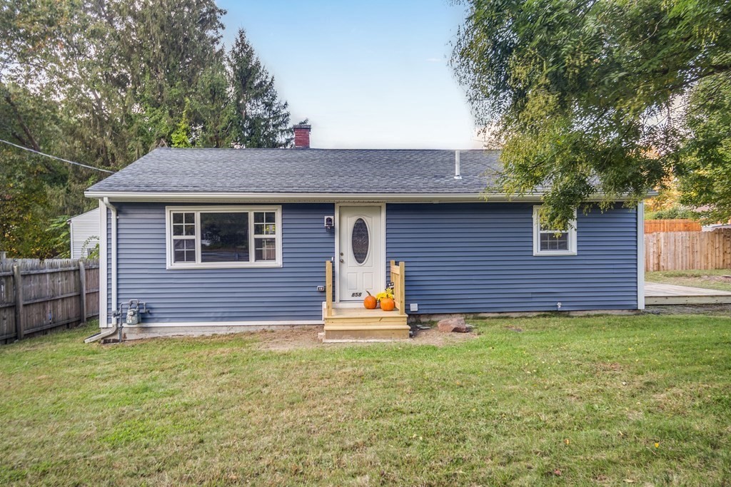 858 Bradley Road Springfield, MA 01109 - Photo 1 of 36 a front view of a house with a yard