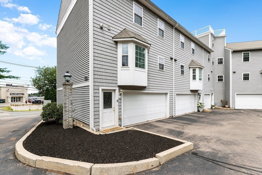 2 Ricciuti Drive, Unit 9 Quincy, MA 02169 - Photo 30 of 40 a view of a house with outdoor space