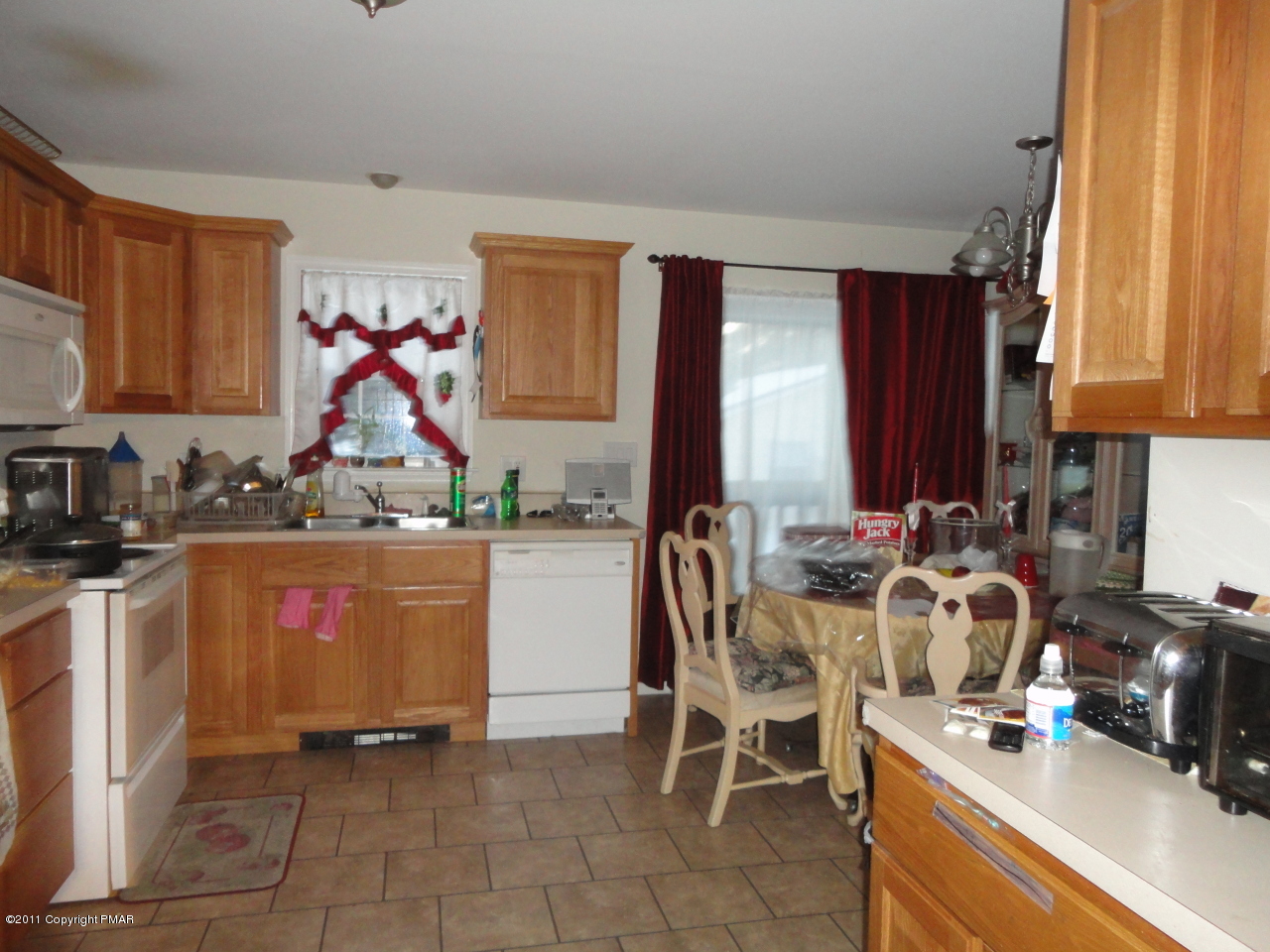701 Mountain Road Albrightsville, PA 18210 - Photo 5 of 5 a view of a kitchen with a sink and cabinets