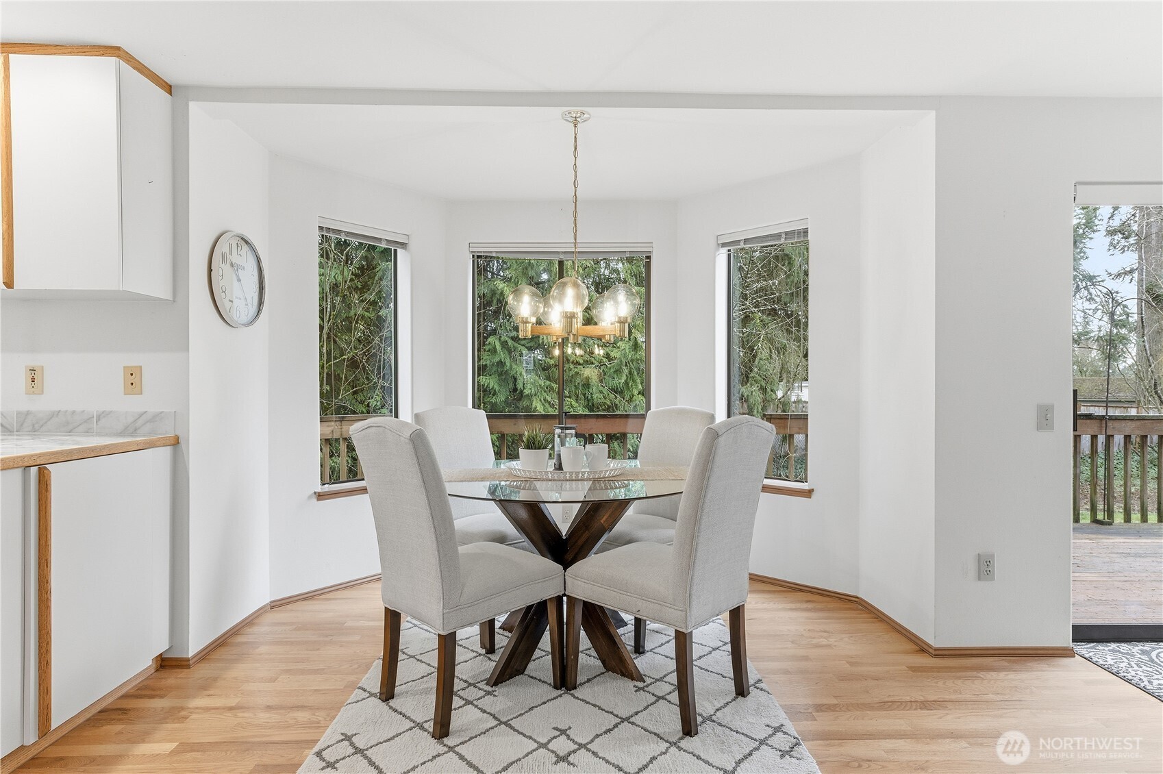 2700 234th Street Southwest Brier, WA 98036 - Photo 11 of 38 a dining room with furniture a chandelier and wooden floor