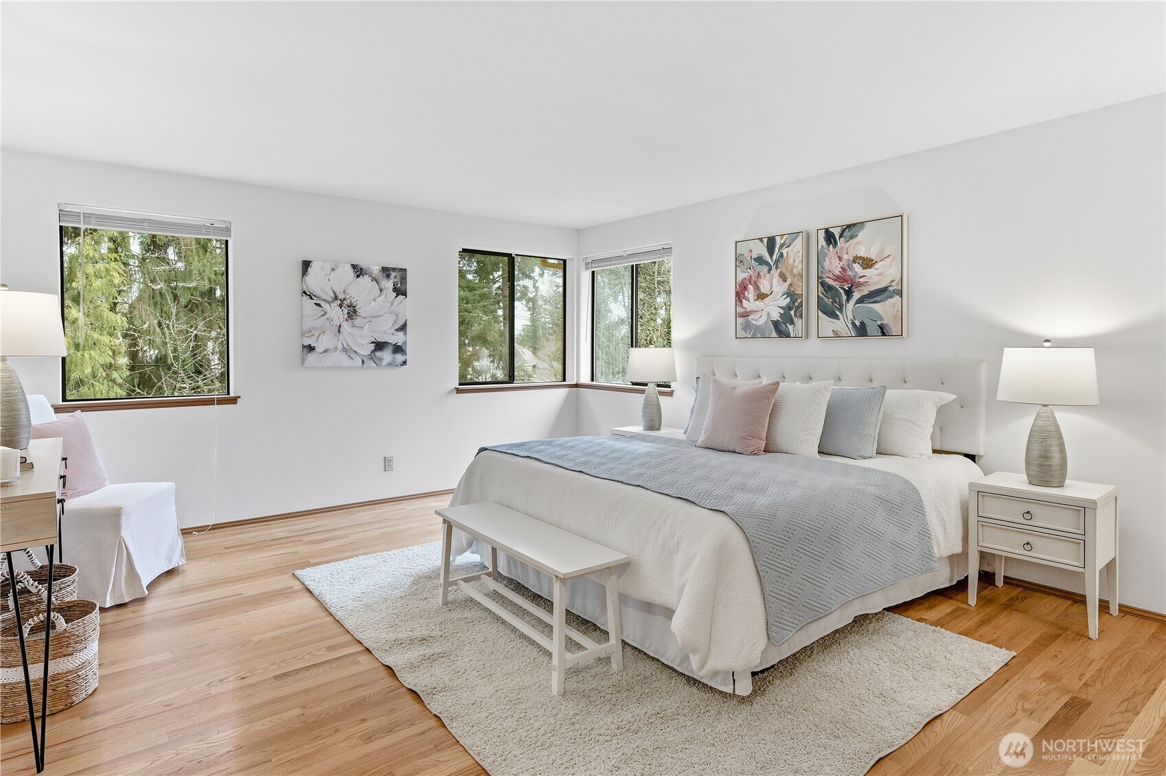 2700 234th Street Southwest Brier, WA 98036 - Photo 16 of 38 a spacious bedroom with a bed and a table in it