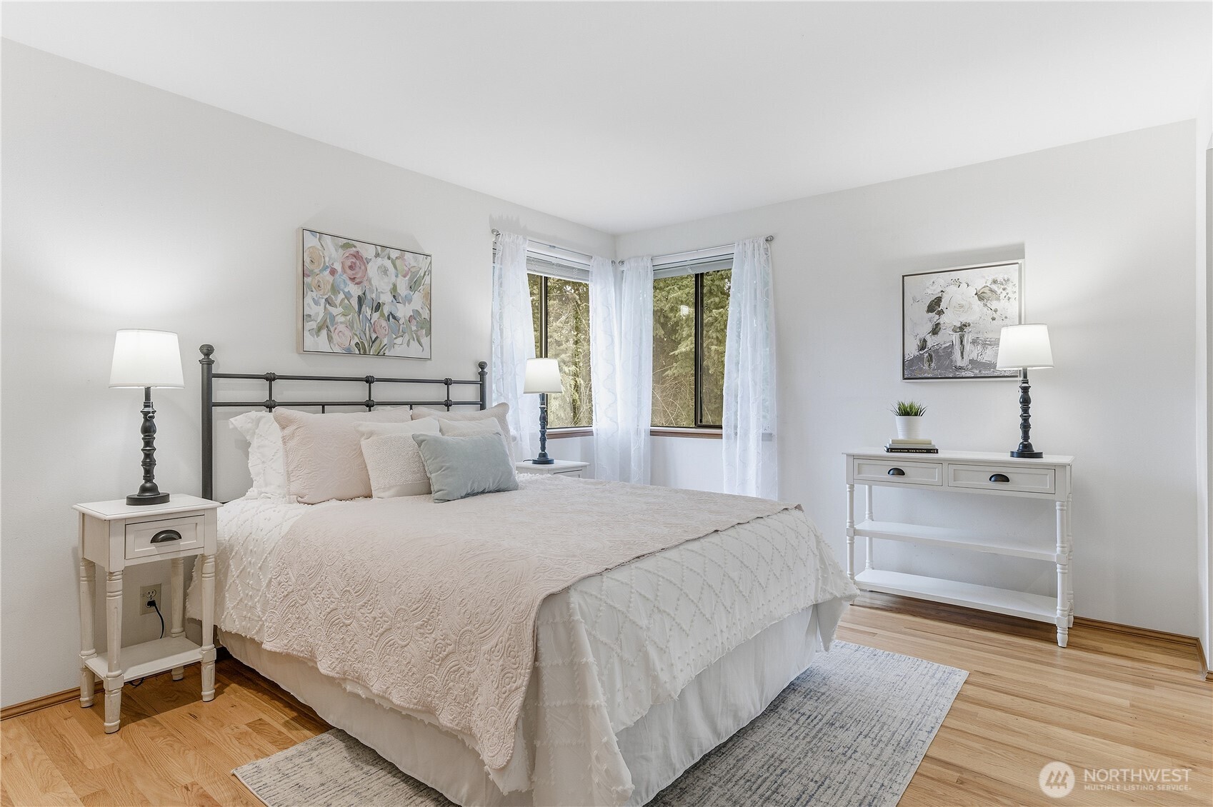 2700 234th Street Southwest Brier, WA 98036 - Photo 22 of 38 a bedroom with a bed and a table