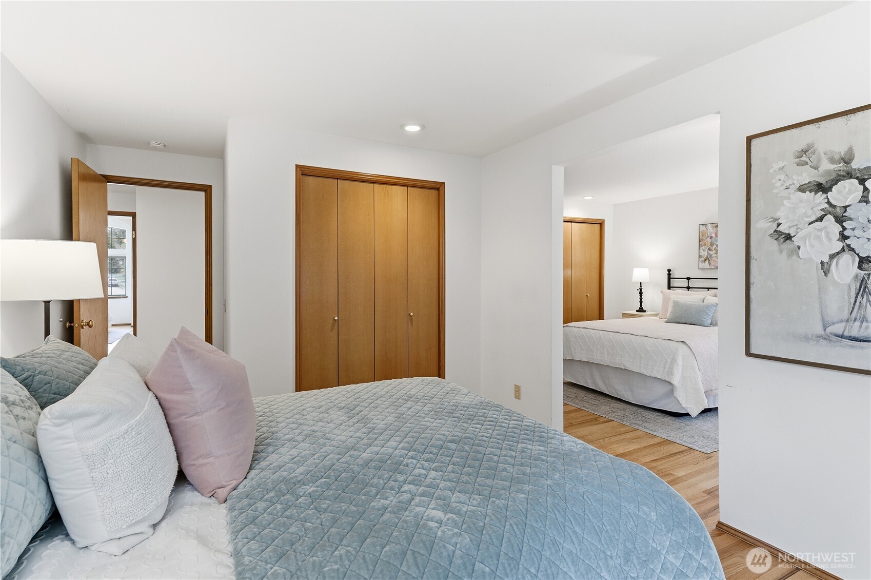 2700 234th Street Southwest Brier, WA 98036 - Photo 25 of 38 a bedroom with a large bed and a couch