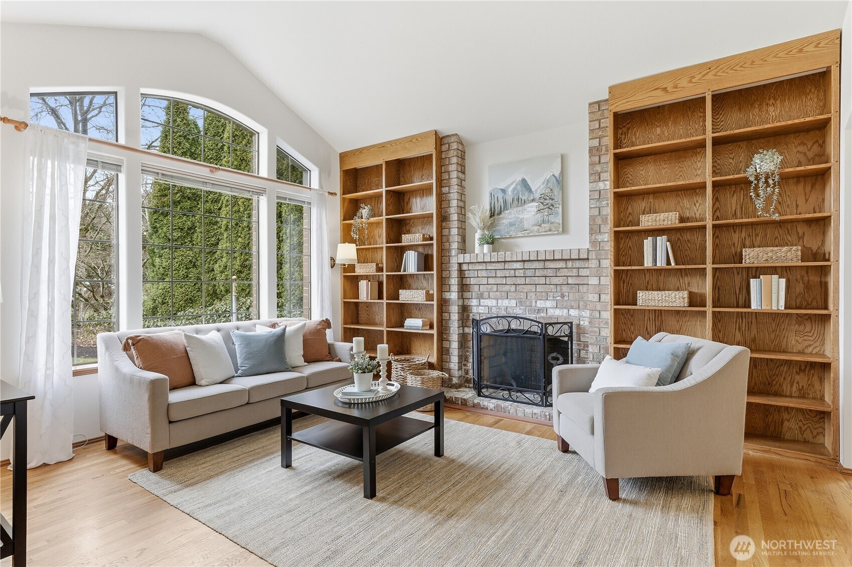 2700 234th Street Southwest Brier, WA 98036 - Photo 3 of 38 a living room with furniture fireplace and a large window