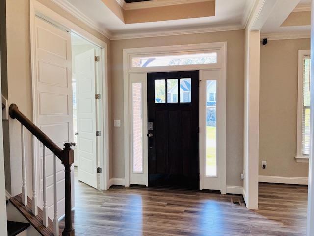 1717 Banks View Drive Raleigh, NC 27603 - Photo 3 of 33 a view of a hallway with wooden floor and staircase