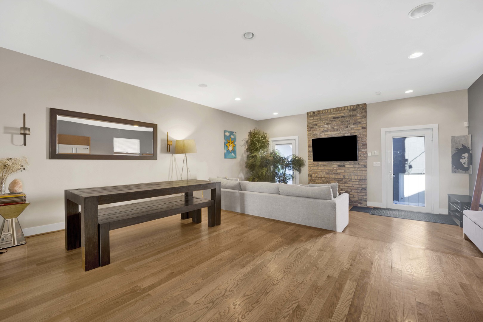 2648 West Homer Street Chicago, IL 60647 - Photo 16 of 49 a living room with furniture and a wooden floor
